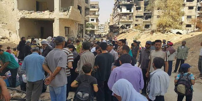 Daraya-City-families-militants-evacuate-settlement-Damascus-Countryside-3.jpg