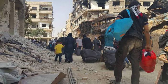 Daraya-City-families-militants-evacuate-settlement-Damascus-Countryside-4.jpg